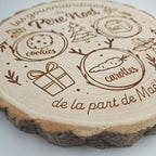 Détail de la gravure du plateau du Père Noël avec prénoms personnalisés